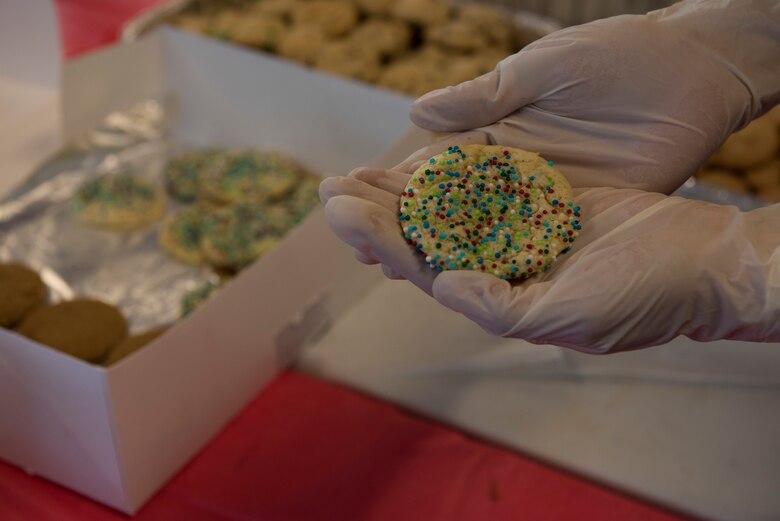 Gunfighter spouses bag cookies for Airmen living in the dorms during the holiday season December 10, 2018, at Mountain Home Air Force Base, Idaho. The cookies give Airmen a taste of home away from home. (U.S. Air Force photo by Airman Nicholas Swift)