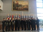 Rear Adm. Jimmy Pitts, Commander, Submarine Group 7, center, and Rear Adm. Jung Il Shik, Commander, Republic of Korea (ROK) Navy Submarine Force pose with a bilateral delegation during the biannual Submarine Warfare Committee Meeting with the ROK Navy Submarine Force.