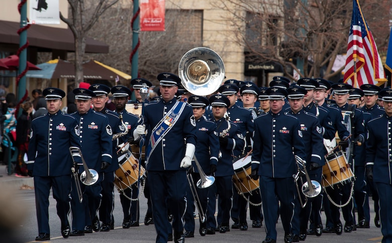 The United States Air Force Academy Band marches during the 2018 Colorado Springs Veterans Day parade in Colorado Springs, Colorado, Nov. 3, 2018. The parade honored veterans and inspired community awareness while paying tribute to the service and sacrifices many have endured in the pursuit of freedom. (U.S. Air Force photo by Staff Sgt. Matthew Coleman-Foster)