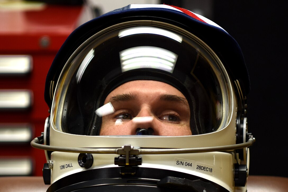 a U-2 Dragon Lady pilot waits in his pressure suit
