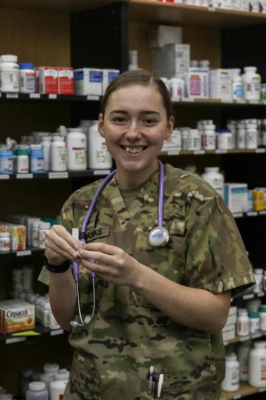 U.S. Army Pfc. Megan Wilbanks, a healthcare specialist with Headquarters and Headquarters Company, 35th Combat Aviation Brigade, a Missouri Army National Guard unit headquartered in Sedalia, Missouri, assists in the pharmacy at the 935th Aviation Support Battalion combined aid station, Camp Buehring, Kuwait, Dec. 10, 2018.  The CAS provided level-two medical care to U.S. Soldiers assigned to the 35th CAB.