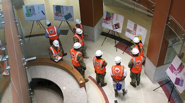 Members of the 85th Medical Brigade, Camp Humphrey, Republic of Korea, are briefed on the staging element for equipping and furnishing the new 772,000 square foot Brian Allgood Army Community Hospital and Ambulatory Care Center.