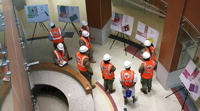 Members of the 85th Medical Brigade, Camp Humphrey, Republic of Korea, are briefed on the staging element for equipping and furnishing the new 772,000 square foot Brian Allgood Army Community Hospital and Ambulatory Care Center.