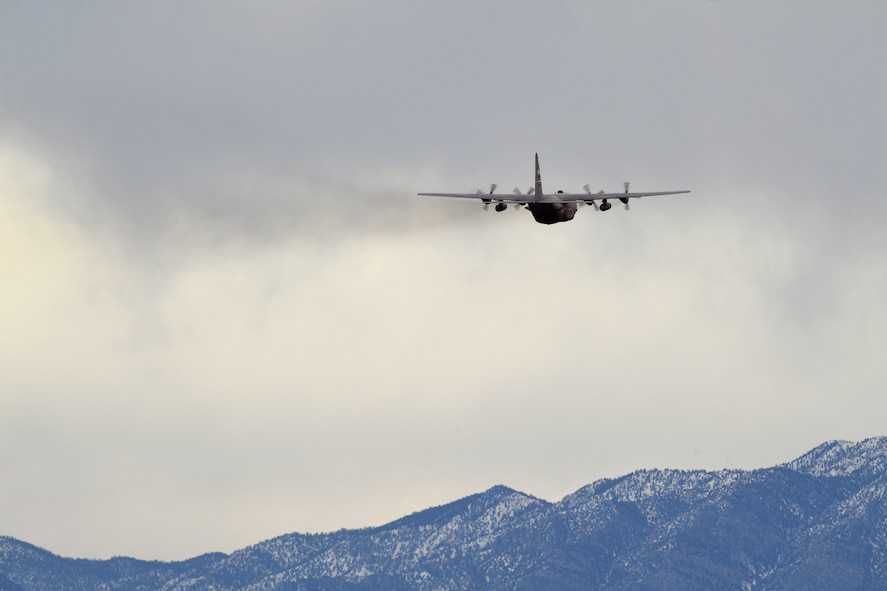 A C-130 Hercules aircraft takes off from Creech Air Force Base, Nevada, Dec. 8-10, 2018, as the base supported a Joint Forcible Entry exercise. As one of the most challenging and complex missions of the year, JFE integrates decisive action and demonstrates crisis response as well as global mobility. (U.S. Air Force Photo by Senior Airman James Thompson)