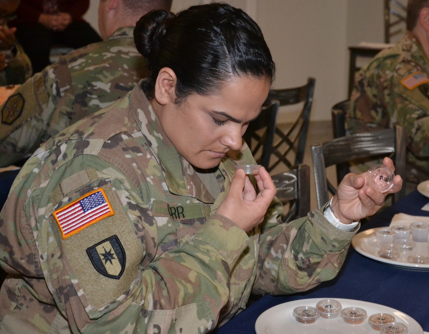 Capt. Liela Carr, 232nd Medical Battalion company commander, smells the aroma of spices during a meditation exercise for “The Gift of Presence: Resiliency Reset” event at the Vogel Resiliency Center at Joint Base San Antonio-Fort Sam Houston Nov. 30.