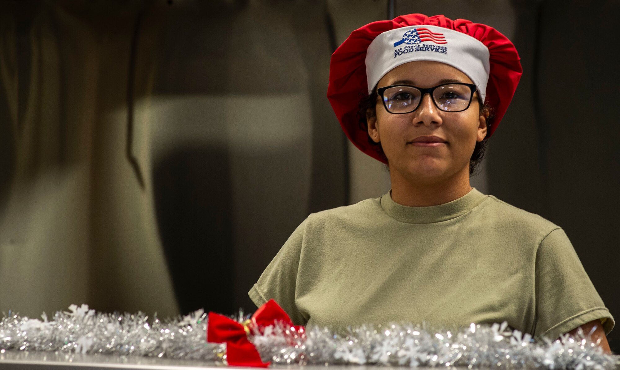 U.S. Air Force Airman 1st Class Michelle Martin, 20th Force Support Squadron food service shift leader, poses for a photo at Shaw Air Force Base, S.C., Dec. 13, 2018.