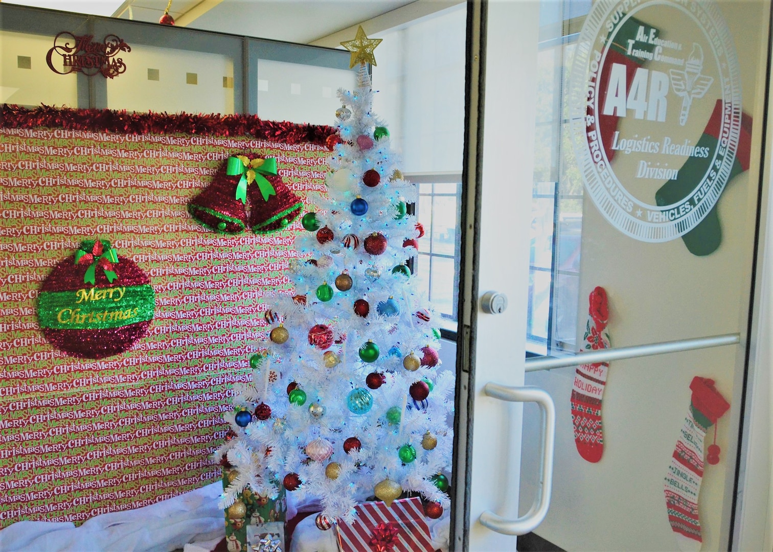 The entrance of the Air Education Training Command, A4R Logistics and Readiness office is decorated with a Christmas tree and stockings by Marc Collette, Headquarters AETC, command equipment manager, A4R, Dec. 4, 2018 at Joint Base San Antonio, Texas. Every decoration is purchased with Collette’s own money and he utilizes his family day after Thanksgiving to set up.