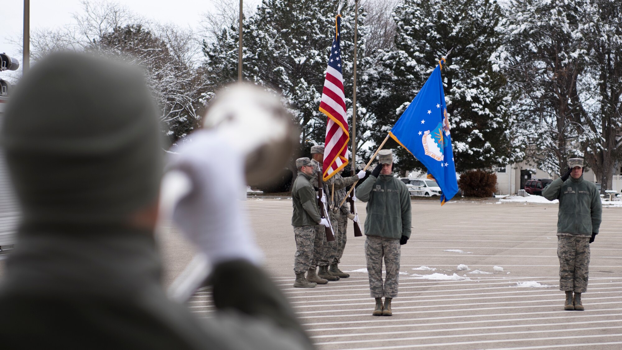 Staff Sgt. Mark Zajac, U.S. Air Force Honor Guard ceremonial guardsman training flight instructor, salutes during the playing of taps Dec. 7, 2018, at Mountain Home Air Force Base, Idaho. The U.S. Air Force Honor Guard held a ceremonial guardsman training course Dec. 3-12 to help the base honor guard maintain their skills during multiple member sequence training. (U.S. Air Force photo by Airman 1st Class Andrew Kobialka)