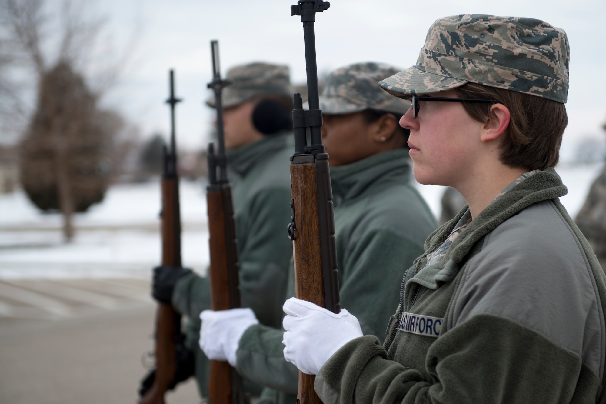 Base ceremonial guardsmen stand in a rifle party formation during funeral sequence training Dec. 7, 2018, at Mountain Home Air Force Base, Idaho. The U.S. Air Force Honor Guard held a ceremonial guardsman training course Dec. 3-12 to help the base honor guard maintain their skills during multiple member sequence training. (U.S. Air Force photo by Airman 1st Class JaNae Capuno)