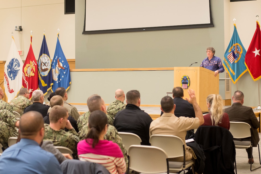 Rob Aptaker, the guest speaker and American Indian storyteller, takes questions from the audience during a National American Indian Heritage Month program at DLA Troop Support, Dec. 11, 2018 in Philadelphia.