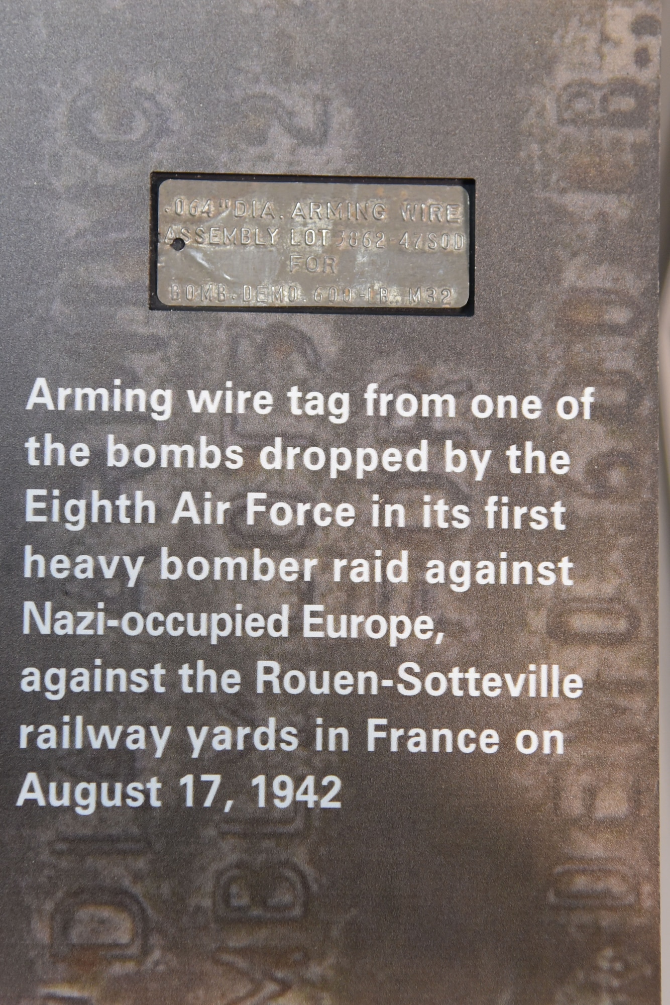 WWII arming wire tag from one of the bombs dropped by the Eighth Air Force in its first heavy bomber raid against Nazi-occupied Europe, against the Rouen-Sotteville railway yards in France on August 17, 1942.