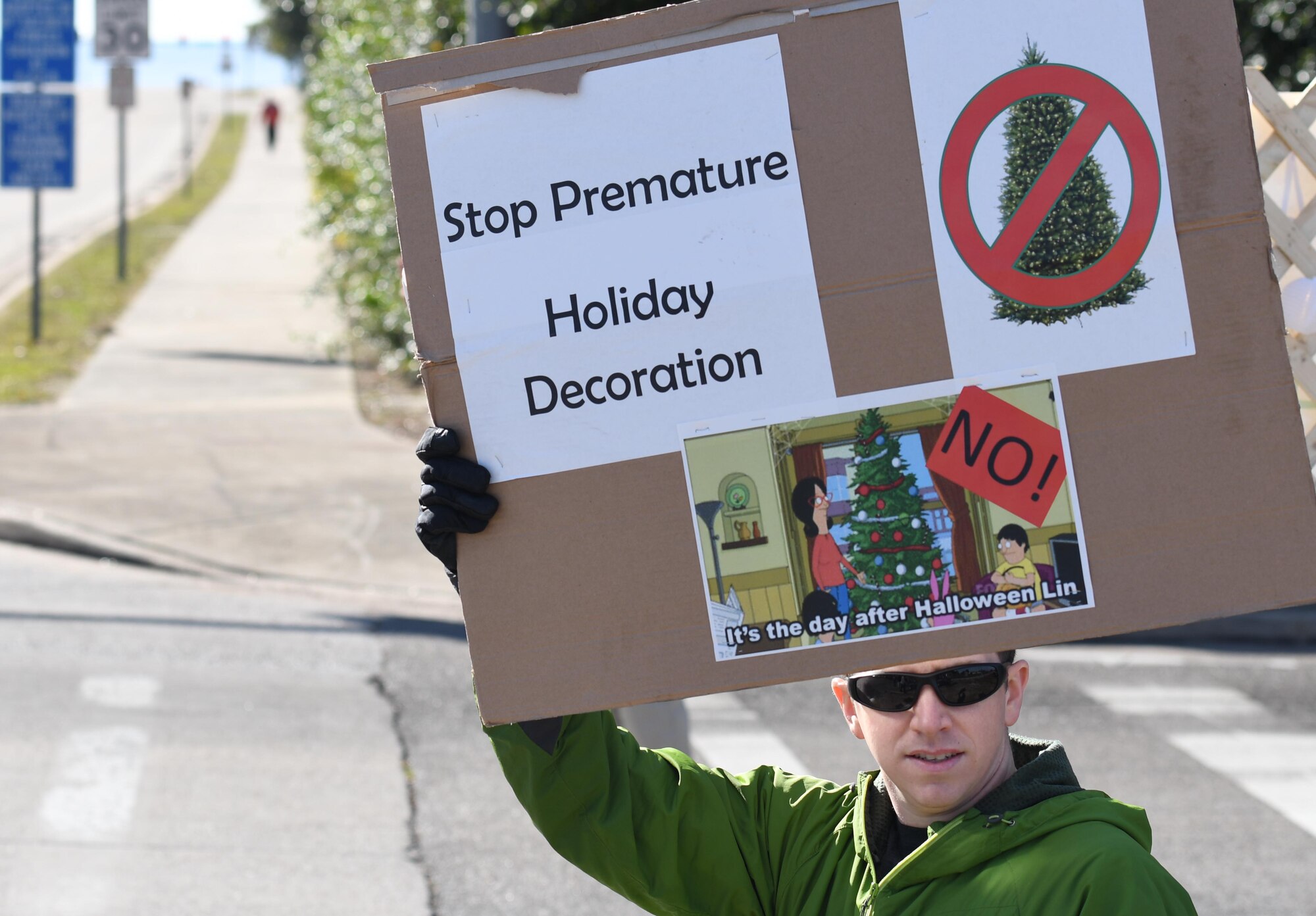 U.S. Air Force Tech. Sgt. Matthew Sharp, 81st Training Support Squadron qualification training liaison, portrays a "protestor" during the 81st Security Forces Squadron protest drill at Keesler Air Force Base, Mississippi, Dec. 12, 2018. The scenario included peaceful protestors expressing their first amendment right that further escalated to a riot when they felt they weren't being heard. The drill, which was a joint effort with the Biloxi Police Department, was conducted to control or prohibit demonstrations and protests. (U.S. Air Force photo by Kemberly Groue)