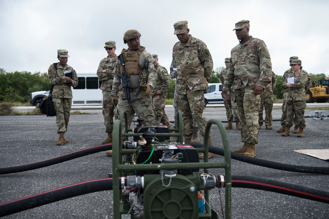 Gen. CQ Brown, Jr., Pacific Air Forces commander, and Chief Master Sgt. Anthony Johnson, PACAF command chief, meet with members of the 36th Contingency Response Group, during a visit to Andersen Air Force Base, Guam, Dec.10, 2018. Brown visited with Airmen across the installation and encouraged them to step up and share their innovative ideas as the command works together to be ready, resilient and postured for the future. (U.S. Air Force photo by Senior Airman Zachary Bumpus)