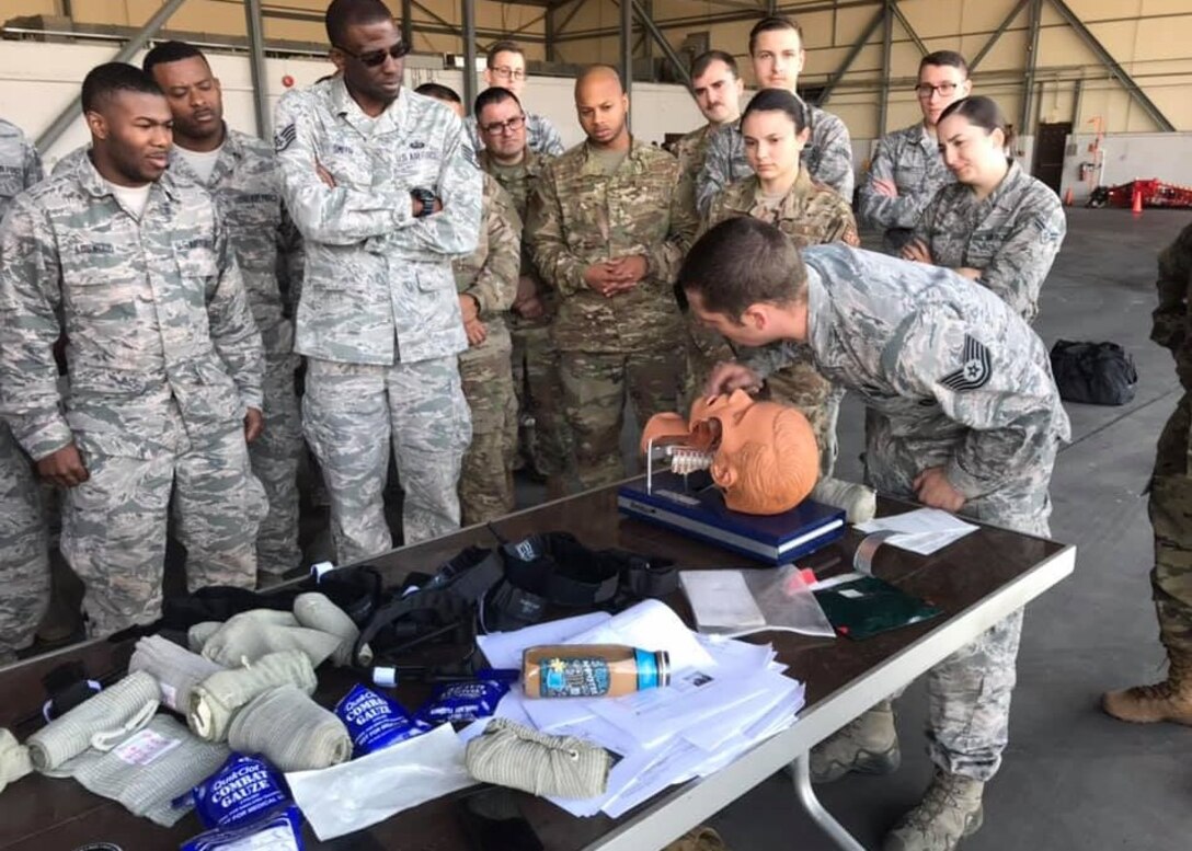 U.S. Air Force Airmen assigned to the 39th Air Base Wing learn Self Aid Buddy Care techniques during an Ability to Survive and Operate Rodeo at Incirlik Air Base, Turkey, Dec. 3, 2018.