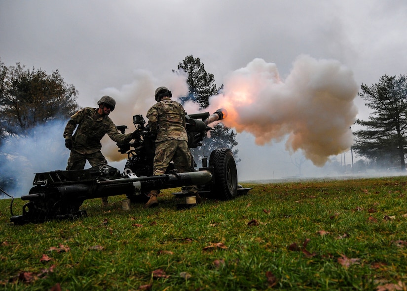 New Jersey Army National Guard 3-112th Field Artillery Regiment Soldiers fire ceremonial rounds for the U.S. Army Reserve 99th Readiness Division change of command ceremony, Dec. 16 at Doughboy Gym, on Joint Base McGuire-Dix-Lakehurst, New Jersey. The 99th DIV(R) is headquartered on JBMDL, which is the second-largest employer in New Jersey, second only to the state government. More than 40,000 active-duty and reserve-component service members, civilian employees and family members work and reside on the base.