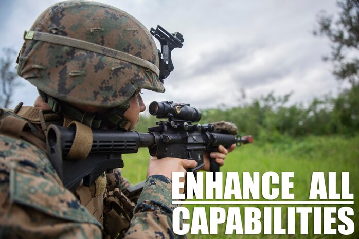 Cpl. Bo J. Bloom provides security at Kin Blue Training Area, Okinawa, Japan on Dec. 12, 2018 during 3rd Marine Logistics Group's Command Post Exercise 19.1. The purpose of MLG CPX 19.1 is to train 3rd MLG's command element, enhance the unit's warfighting capabilities and to assist the commanding general with maintaining situational awareness while making timely decisions. Bloom, a native of Thousand Oaks, California, is an assistant platoon sergeant with Jump Platoon, Headquarters Company, Combat Logistics Regiment 37. (U.S. Marine Corps photo by Lance Cpl. Terry Wong)