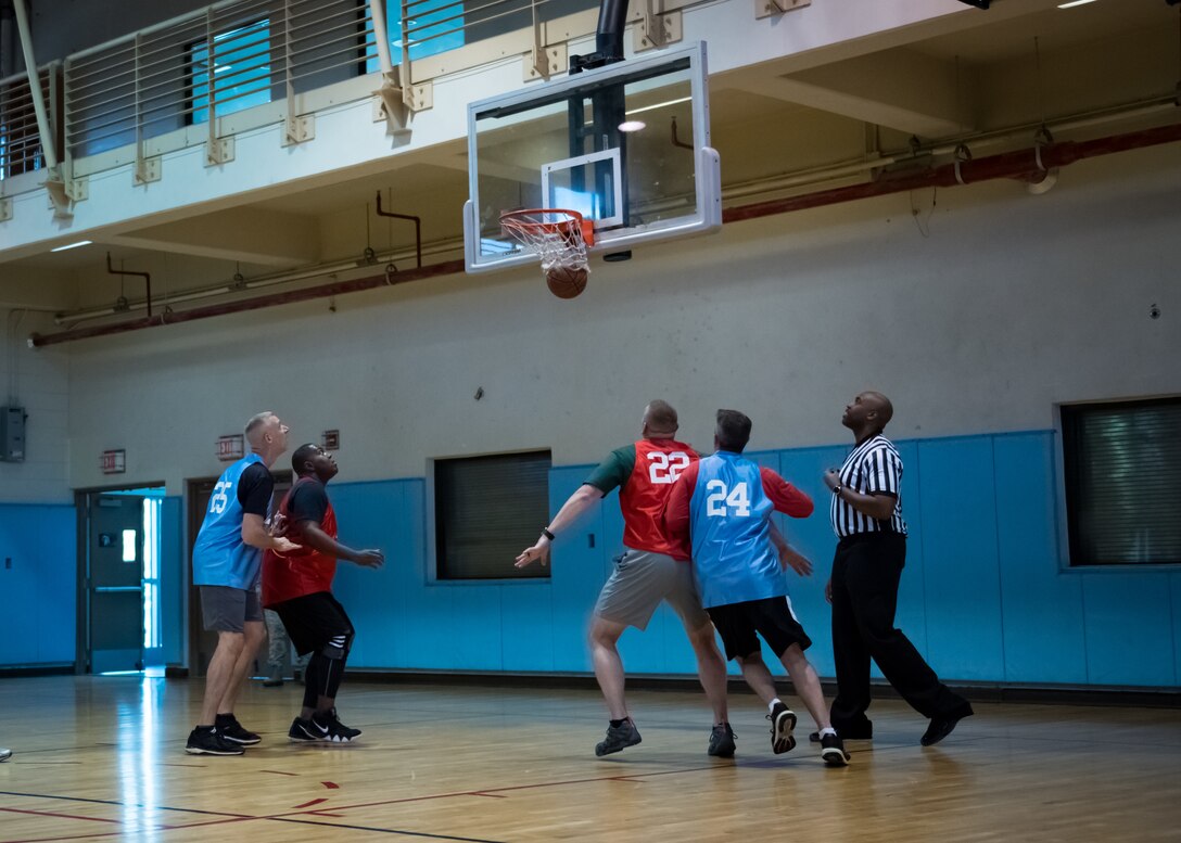 U.S. Air Force chief master sergeants and colonels from the 51st Fighter Wing play Basketball in the Chiefs Vs. Eagles game at Osan Air Base, Republic of Korea, Dec. 14, 2018.