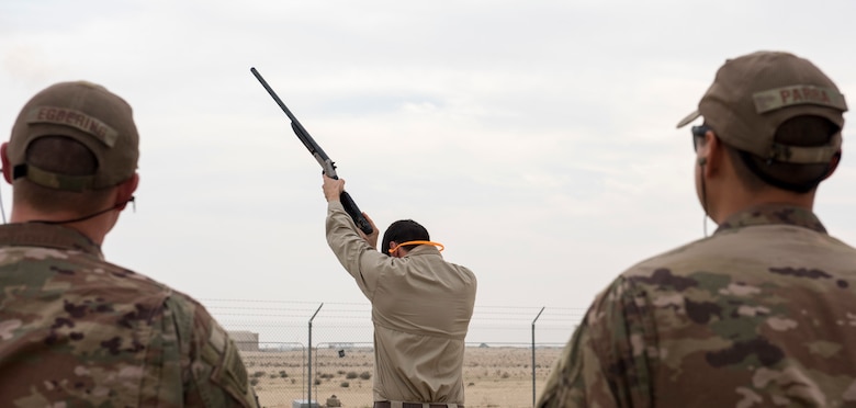 Tyler Adams, United States Department of Agriculture wildlife biologist, demonstrates proper technique when firing pyrotecnics, Dec. 3, 2018, at an undisclosed location in Southwest Asia. Adams trained Airmen across the area of responsibility in hopes to mitigate the number of birdstrikes on aircraft.