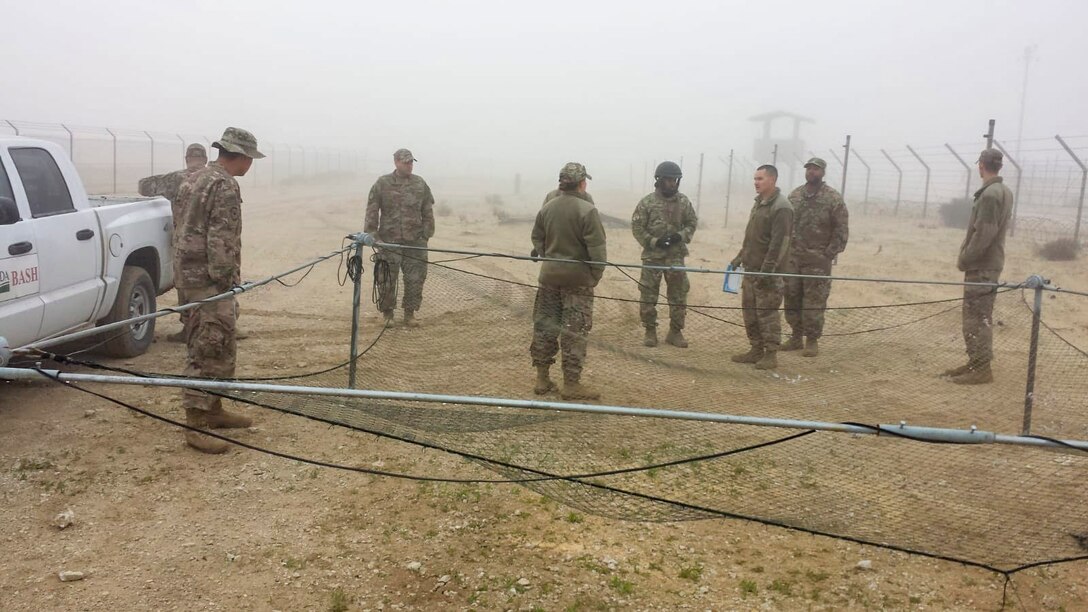 Airfield managers learn how to use a drop net to remove birds from the area at an undisclosed location in Southwest Asia, Dec. 4, 2018. Although the main focus of this training was to deter animals, training also heavily focused on building a continuity binder, where airfield managers can document animal sightings, food sources and water sources