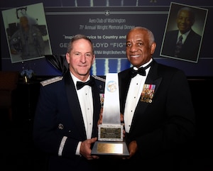 Air Force Chief of Staff Gen. David L. Goldfein and retired Gen. Lloyd Newton, the 2018 Wright Brothers Memorial Trophy winner, pose for a photo after the 71st National Aeronautics Association Wright Brothers Memorial Dinner in Washington, D.C., Dec. 14, 2018. According to a NAA press release, the trophy was created in 1948 and is presented annually to a “living American who has contributed significant public service of enduring value to aviation in the United States.” (U.S. Air Force photo by Staff Sgt. Rusty Frank)