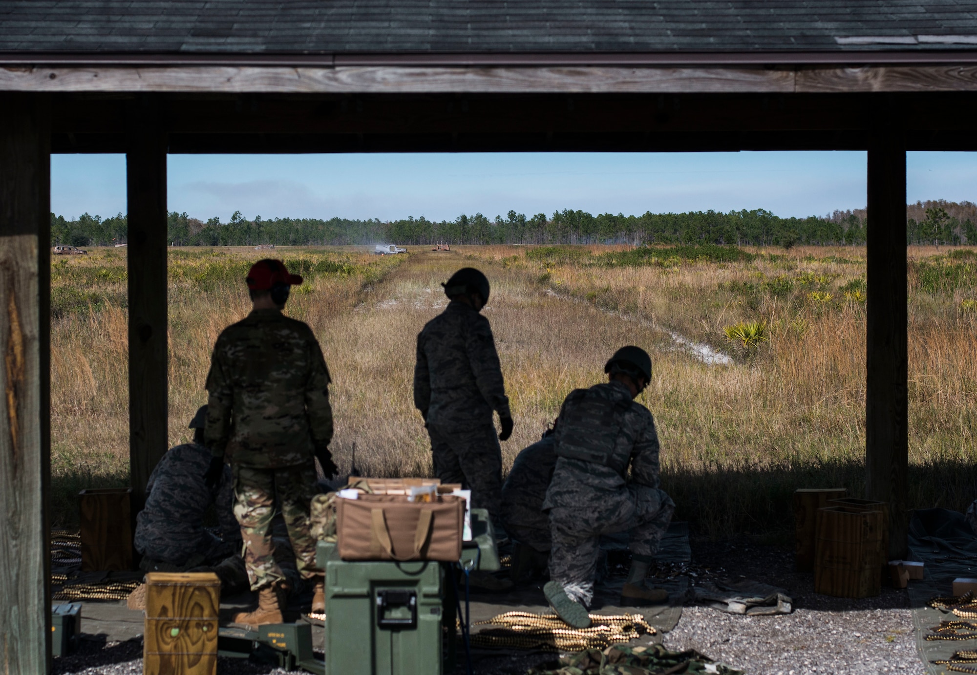 U.S. Air Force Airmen and combat arms instructors assigned to the 6th Security Forces Squadron fire at targets down-range during heavy weapons training at Avon Park Air Force Range, Fla., Dec. 12, 2018.