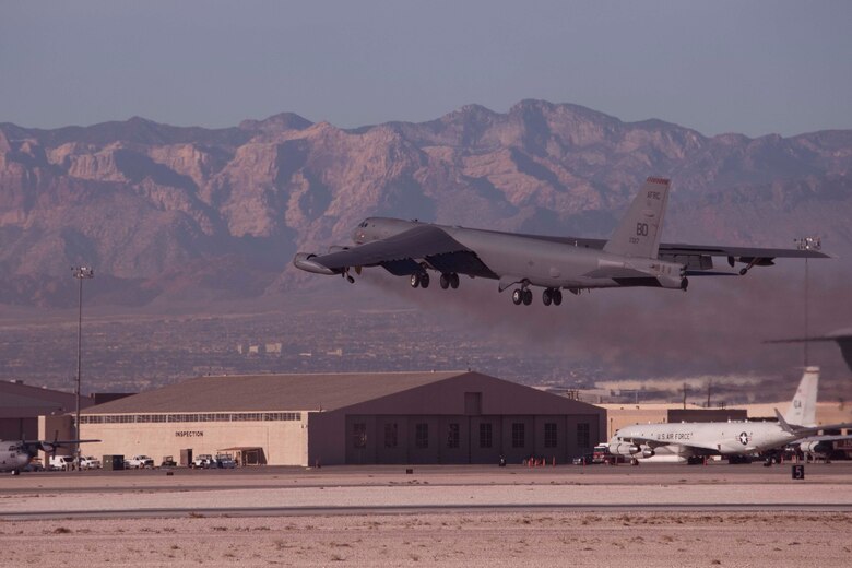A B-52 Stratofortress with the 340th Weapons Squadron takes off over Nellis Air Force Base, Nevada, Dec. 11, 2018.  Members of the 340th WPS took part in the biannual Weapons School Integration exercise.  They were supported maintainers from the 307th Bomb Wing and 2nd BW from Barksdale Air Force Base, Louisiana.  The maintainers regularly leverage experience and manpower in the total force integration model.   The WSINT provided war time scenarios to enhance maintainer and air crew readiness. (U.S. Air Force photo by Master Sgt. Ted Daigle)