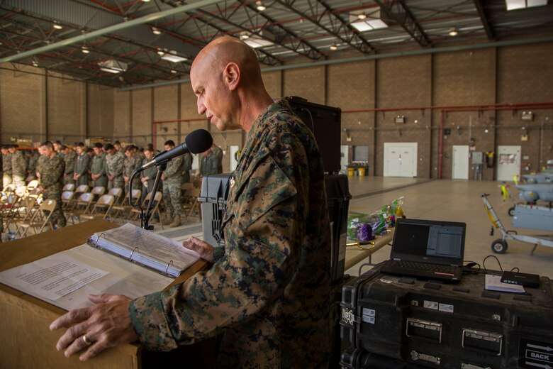 The Marine Corps Air Station (MCAS) Yuma Chaplain, CDR Jeffery Jenkins gives the invocation during the appointment and relief ceremony for Marine Unmanned Aerial Vehicle Squadron one (VMU-1), Nov. 30, 2018 at the VMU-1 hangar. Sgt. Maj. Cisneros served with VMU-1 honorably for just under three years, ensuring that the Marines assigned to the squadron performed their duties exceptionally while continuously building unit morale. (U.S. Marine Corps Photo by Cpl. Sabrina Candiaflores)