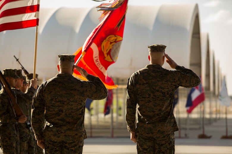 Sgt. Maj. Arturo Cisneros and Sgt. Maj. Jesse Becker, Sergeant Major of Marine Unmanned Aerial Vehicle Squadron one (VMU-1), salute the colors after their relief and appointment ceremony, Nov. 30, 2018 at the VMU-1 hangar. Sgt. Maj. Cisneros served with VMU-1 honorably for just under three years, ensuring that the Marines assigned to the squadron performed their duties exceptionally while continuously building unit morale. (U.S. Marine Corps photo by Cpl. Sabrina Candiaflores)