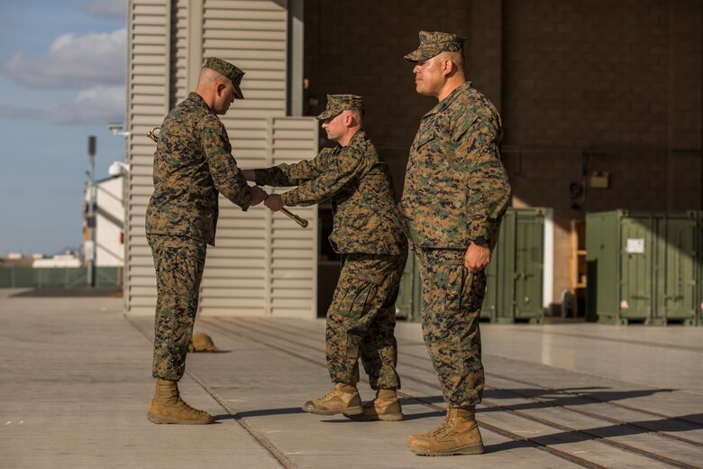 Sgt. Maj. Jesse Becker, Sergeant Major of Marine Unmanned Aerial Vehicle Squadron one (VMU-1), receives the Non-Commissioned Officer sword as a symbol of him being appointed the new squadron sergeant major after relieving Sgt. Maj. Arturo Cisneros, Nov. 30, 2018 at the VMU-1 hangar. Sgt. Maj. Cisneros served with VMU-1 honorably for just under three years, ensuring that the Marines assigned to the squadron performed their duties exceptionally while continuously building unit morale. (U.S. Marine Corps photo by Cpl. Sabrina Candiaflores)