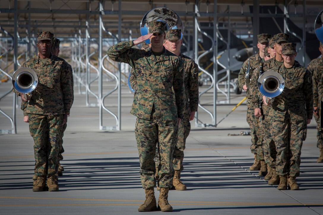 U.S. Marines with the Third Marine Aircraft Wing Band, Marine Corps Air Station (MCAS) Miramar, participate in the Change of Command Ceremony where Lt. Col. Michael W. McKenney, commanding officer for Marine Attack Squadron 311 (VMA-311) relinquished command to Lt. Col. Robb T. McDonald on MCAS Yuma, Ariz., Dec. 13, 2018. The Change of Command Ceremony represents the transfer of responsibility, authority, and accountability from the outgoing commanding officer to the incoming commanding officer. (U.S. Marine Corps photo by Sgt. Allison Lotz)