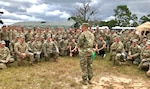 Army Maj. Gen. William "Bill" Hall, commander, Joint Task Force Civil Support, talks with Soldiers and Airmen of the 503rd Military Police Battalion during their recent field training exercise (FTX) at Camp Blanding, Fla., on Oct. 24, 2018. The 503rd is a subordinate battalion that falls under Task Force Operations, one of the major task forces that make up the Defense Chemical, Biological, Radiological and Nuclear Response Force (DCRF). It is part of a 5,200-personnel team that extends across 30 bases throughout the United States ready for any a crisis response. The FTX provided various skilled training in search & rescue and emergency medical treatment.