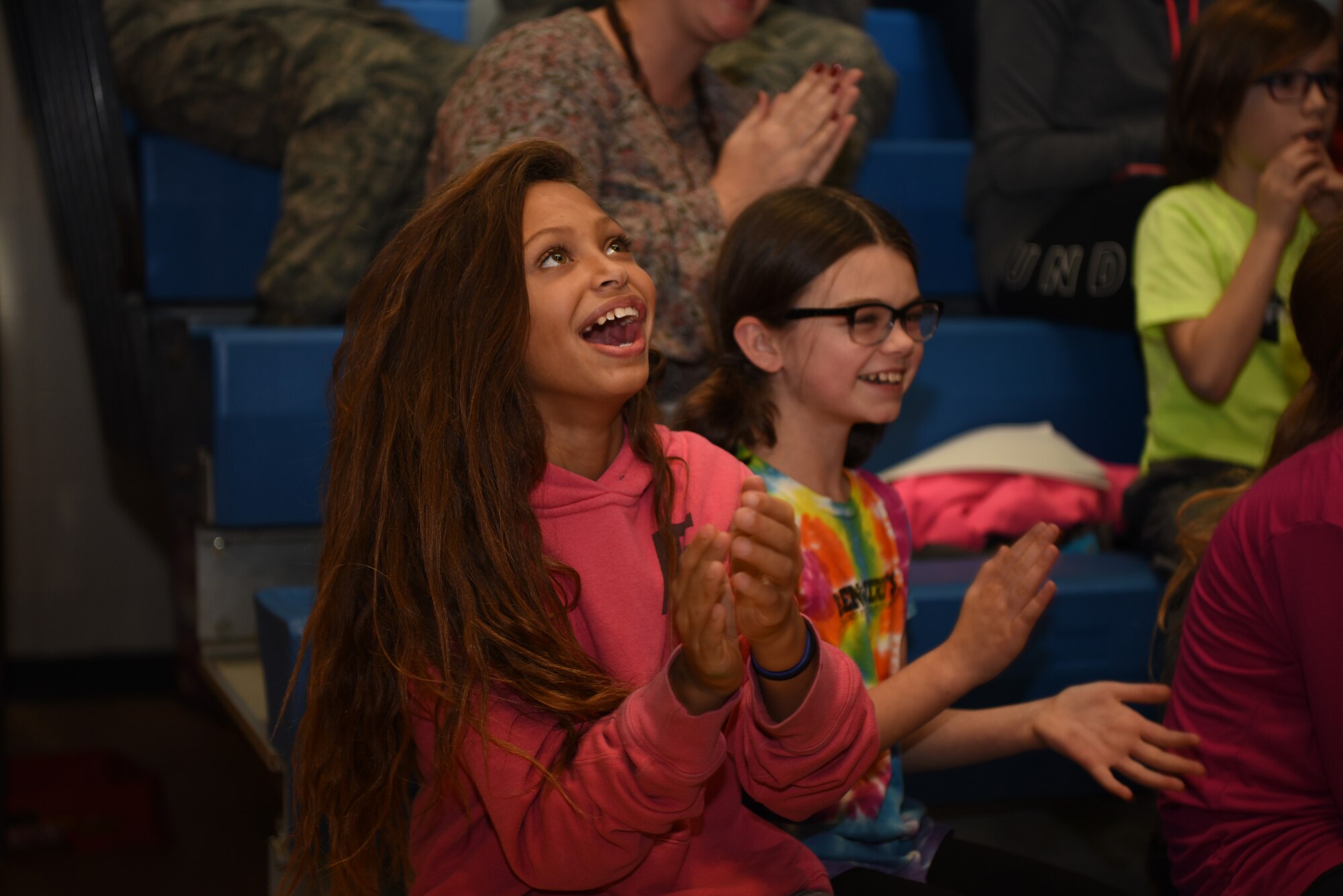 Mea Sijord, 10, and Molly Maguire, 10, discover they won the “Climate Superstars” challenge in the Youth Center, December 12, 2018, on Grand Forks Air Force Base, North Dakota. Maguire said the challenge helped her learn about different ways she can help the environment during all seasons, and she was grateful for the prizes to help her with her homework. (U.S. Air Force photo by Airman 1st Class Melody Wolff)