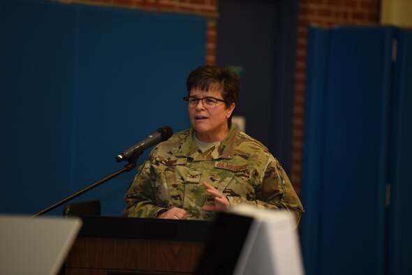 Col. Heather Cook, 319th Mission Support Group commander, congratulates the Torch Club members for their accomplishments, December 12, 2018, on Grand Forks Air Force Base, North Dakota. Cook said she wanted to let the Youth Center members know how proud she was of their hard work and effort to do their part to protect the environment. (U.S. Air Force photo by Airman 1st Class Melody Wolff)
