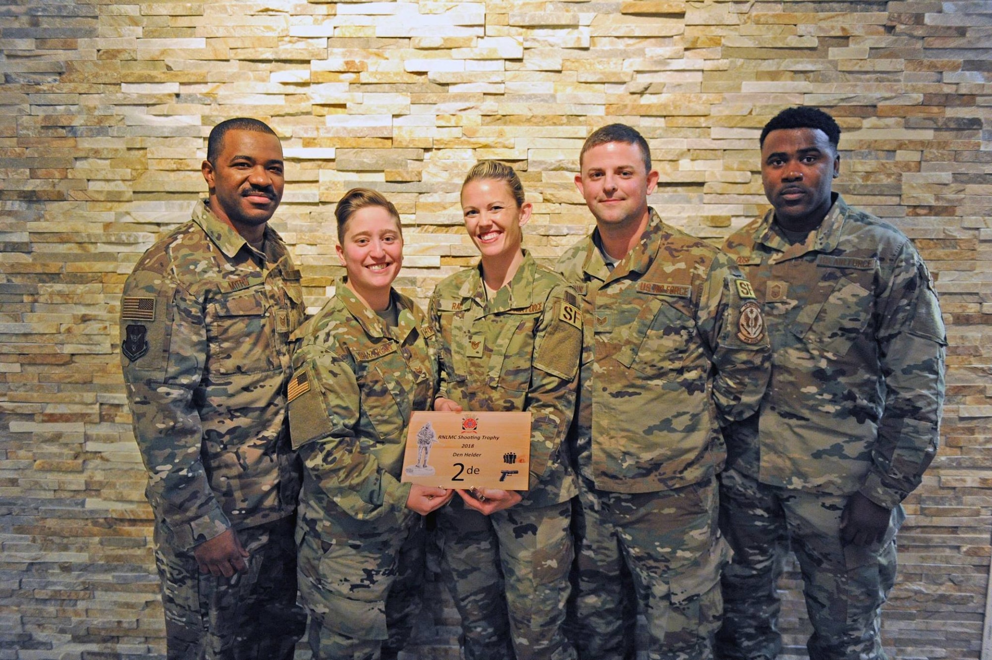 U.S. Air Force Reserve Citizen Airmen take home second place in pistol marksmanship at the 2018 Royal Netherlands Marine Corps Shooting Competition Dec. 15 in Den Helder, the Netherlands. Representing the only U.S. team, Airmen participated alongside 29 teams from 10 countries. (U.S. Air Force photo by Nicholas Janeway)