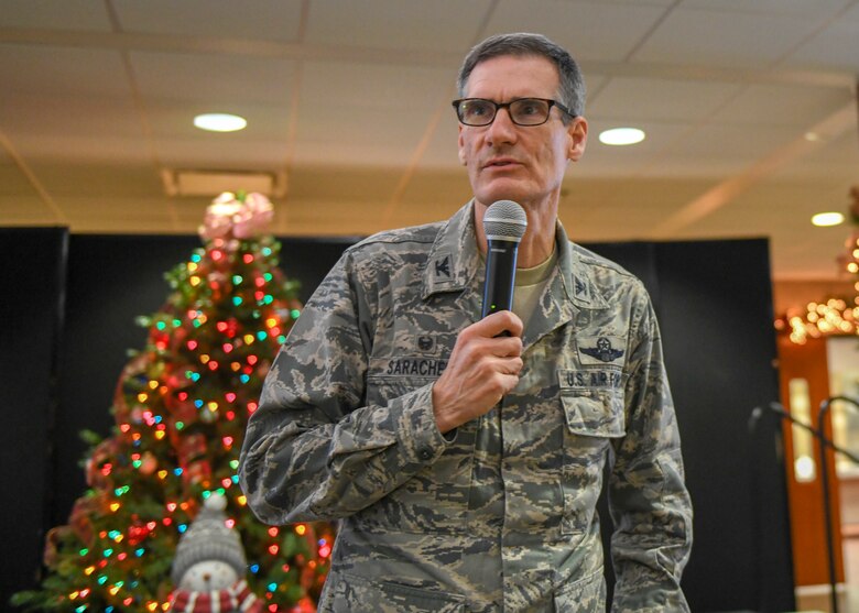 Col. Dan Sarachene, commander of the 910th Airlift Wing, addresses the installation's civilian workforce at a holiday Commander's Call here, Dec. 13, 2012.