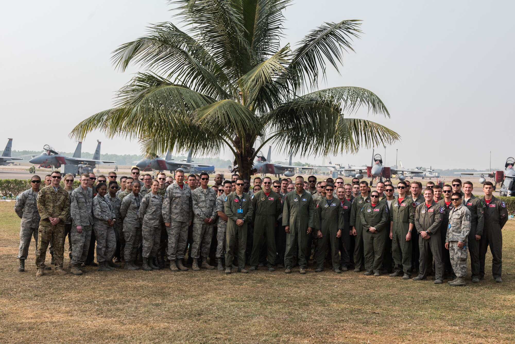 U.S. Air Force Gen. CQ Brown Jr., Pacific Air Forces commander, takes a group photo with Airmen from Kadena Air Base, Japan and the Illinois Air National Guard at Cope India 19 at Kalaikunda Air Force Station, India, Dec. 14,
