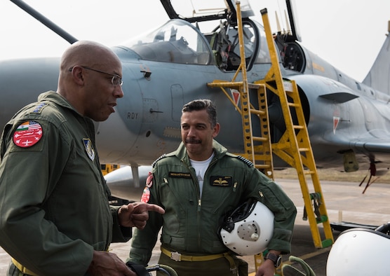 U.S. Air Force Gen. CQ Brown, Jr., Pacific Air Forces commander, discusses his orientation flight in an Indian Air Force Mirage 2000 at Cope India 19 at Kalaikunda Air Force Station, India, Dec. 14, 2018.
