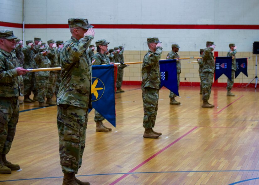 U.S. Army Reserve Soldiers salute during the 99th Readiness Division change of command ceremony, Dec. 16 at Doughboy Gym, on Joint Base McGuire-Dix-Lakehurst, New Jersey. The 99th DIV(R) is headquartered on JBMDL, which is the second-largest employer in New Jersey, second only to the state government. More than 40,000 active-duty and reserve-component service members, civilian employees and family members work and reside on the base.