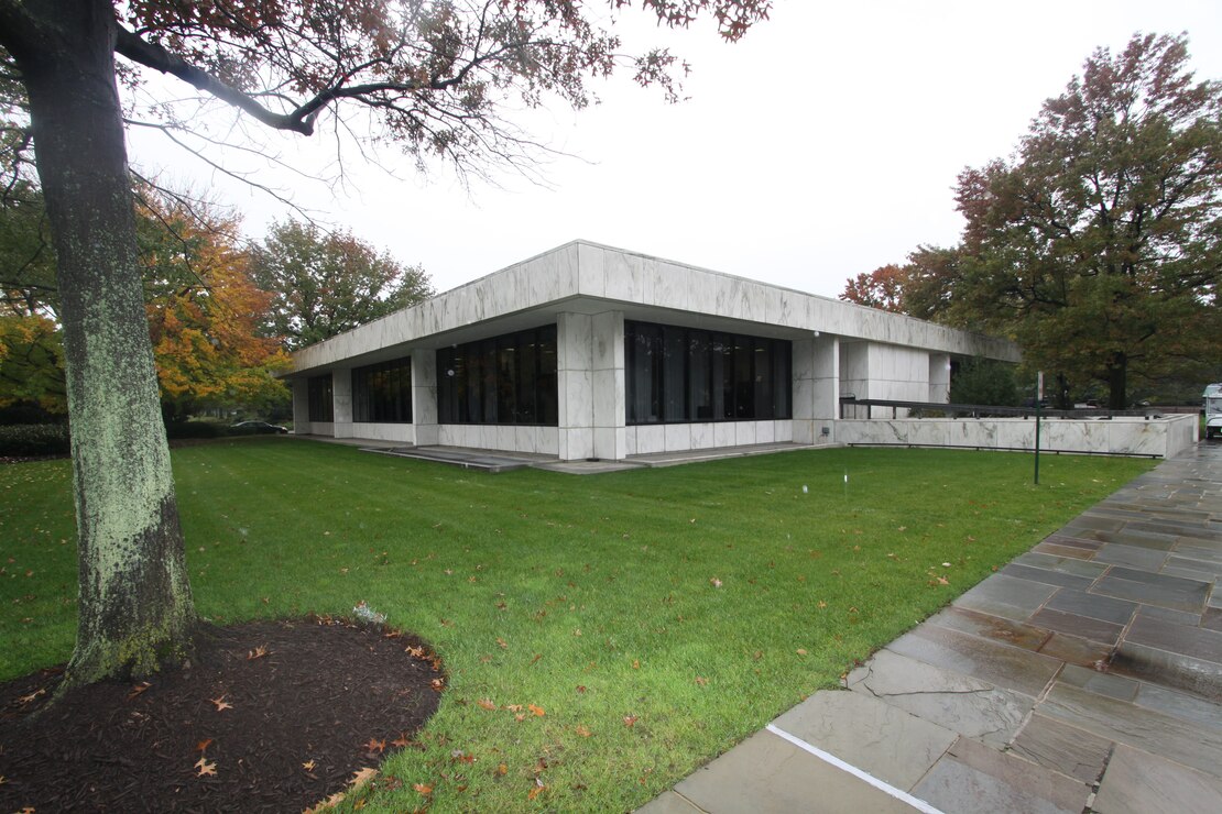 The Arlington National Cemetery administration building houses cemetery staff who plan, coordinate and participate in funeral services, as well as provides waiting areas for family and friends to gather prior to funeral ceremonies.