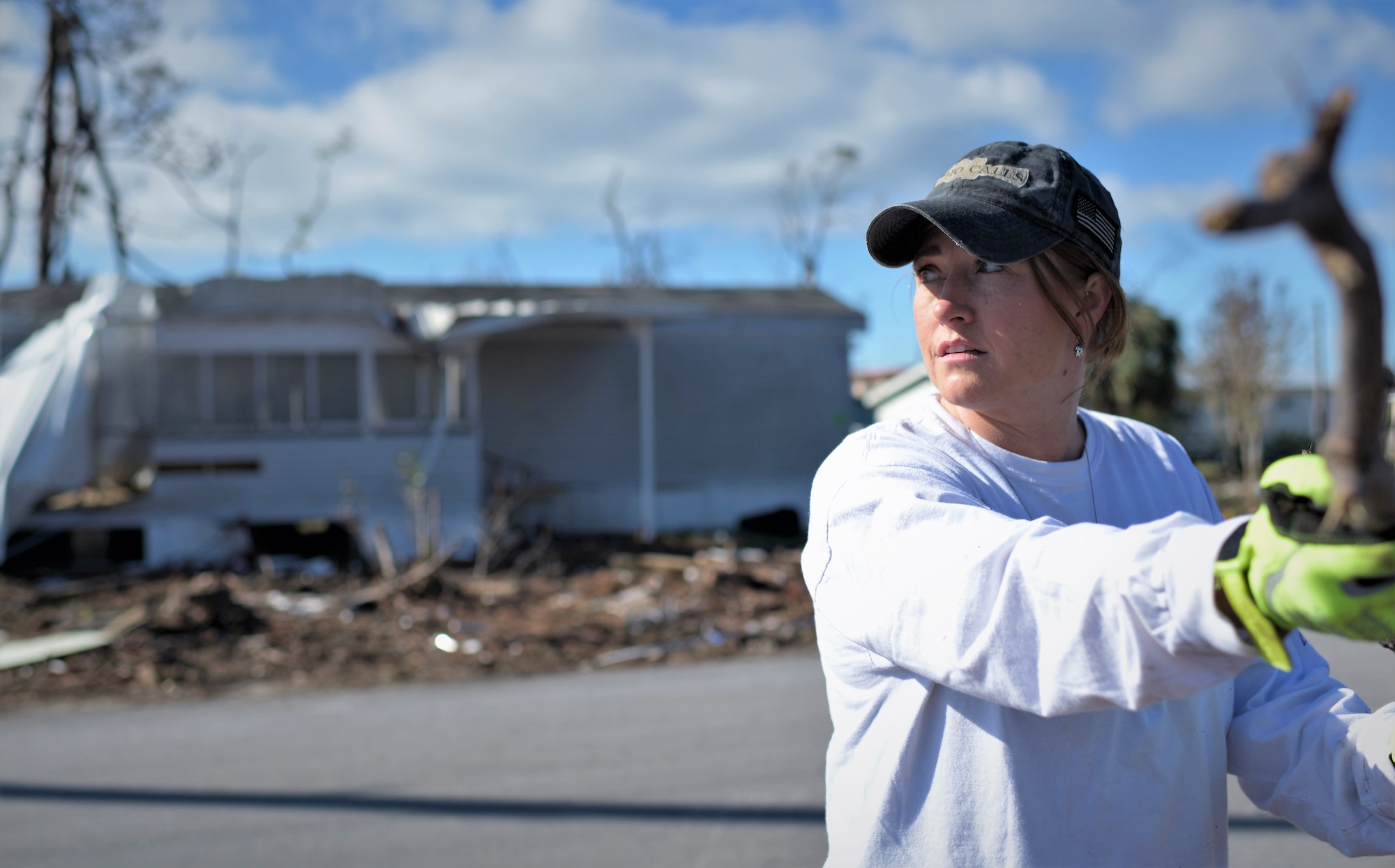 Jennifer Whitesides, a bioenvironmental engineer technician with the 325th Aerospace Medicine Squadron, helps clean Under the Palms Park in Mexico Beach, Fla. Dec. 16, 2018. Thirty nine volunteers from Tyndall and Eglin Air Force Bases came together to help clean Mexico Beach, one of the communities hit the hardest by Hurricane Michael. The volunteers were able to clean up more than 40 cubic yards of debris within four hours. (U.S. Air Force photo by Tech. Sgt. Sara Keller)
