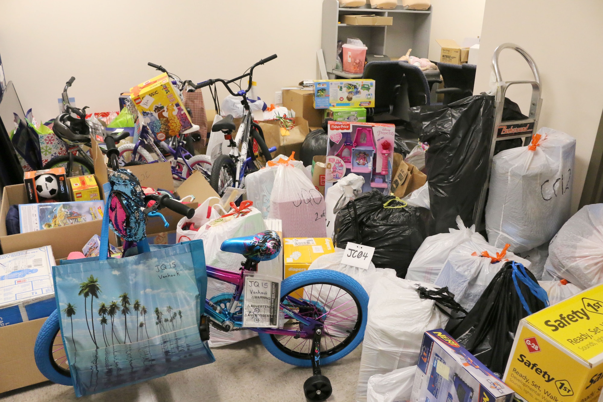 Gifts dropped off for the 2018 AEDC Angel Tree program fill a storage room at the Arnold Air Force Base Medical Aid Station. This year, all 140 children on the Angel Tree list provided to Arnold Air Force Base were sponsored. (U.S. Air Force photo by Brad Hicks)