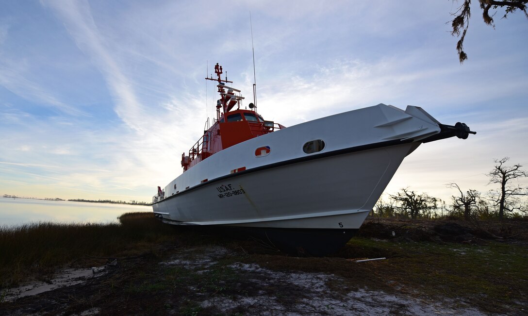 A U.S. Air Force Missile Retriever Ship attached to the 53rd Weapons Evaluation Group sits beached near Tyndall Air Force Base, Fla., Dec. 12, 2018. The vessel was run aground during the powerful winds of Hurricane Michael. The Missile Retriever ship is responsible for the location and recovery of Subscale Aerial Targets in the Gulf of Mexico W151 Live-Fire Range. MR’s also conduct launch and recovery corridor clearance operations for both SSAT and Full-scale Aerial Target Missions. (U.S. Air Force photo by Senior Airman Isaiah J. Soliz)