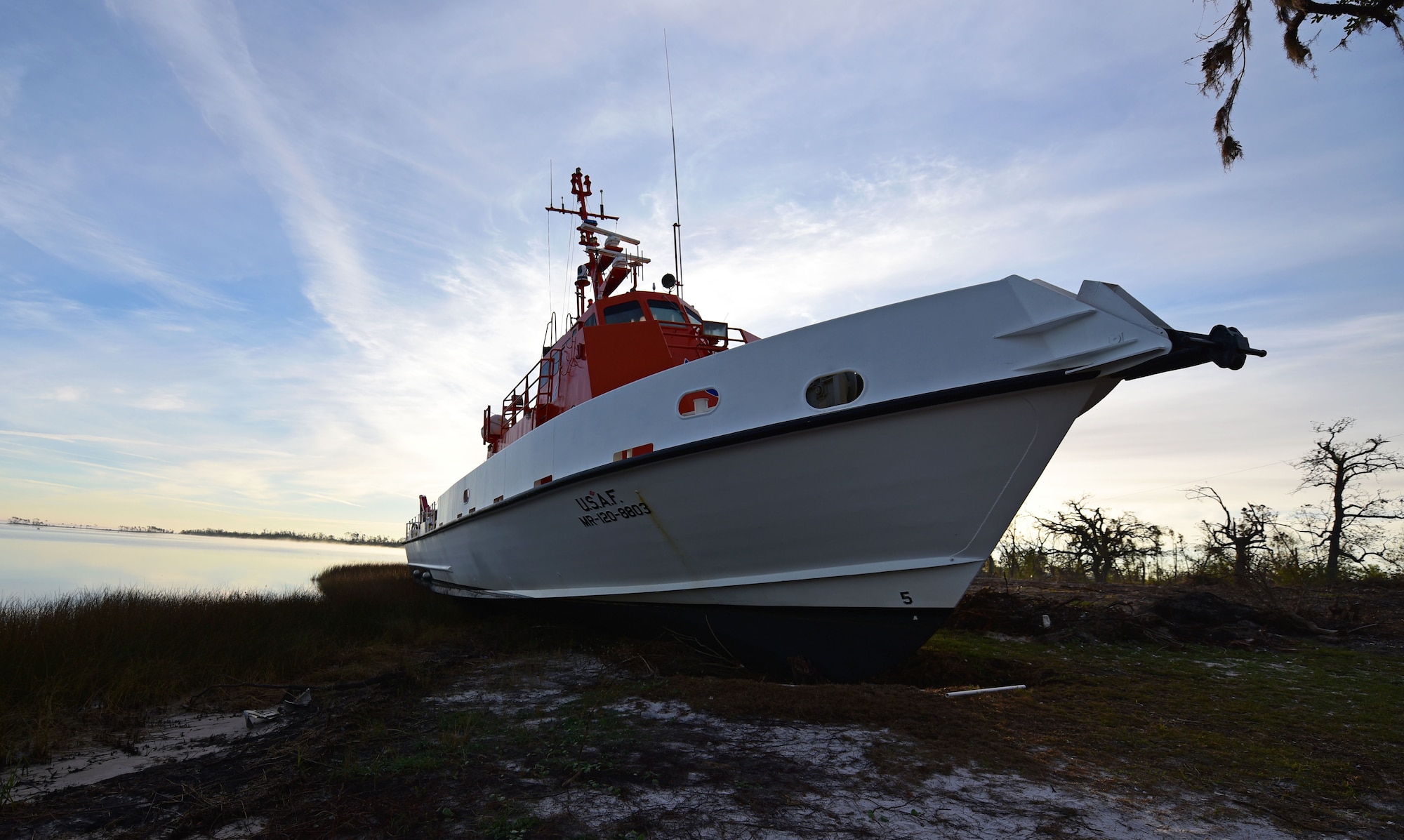A U.S. Air Force Missile Retriever Ship attached to the 53rd Weapons Evaluation Group sits beached near Tyndall Air Force Base, Fla., Dec. 12, 2018. The vessel was run aground during the powerful winds of Hurricane Michael. The Missile Retriever ship is responsible for the location and recovery of Subscale Aerial Targets in the Gulf of Mexico W151 Live-Fire Range. MR’s also conduct launch and recovery corridor clearance operations for both SSAT and Full-scale Aerial Target Missions. (U.S. Air Force photo by Senior Airman Isaiah J. Soliz)