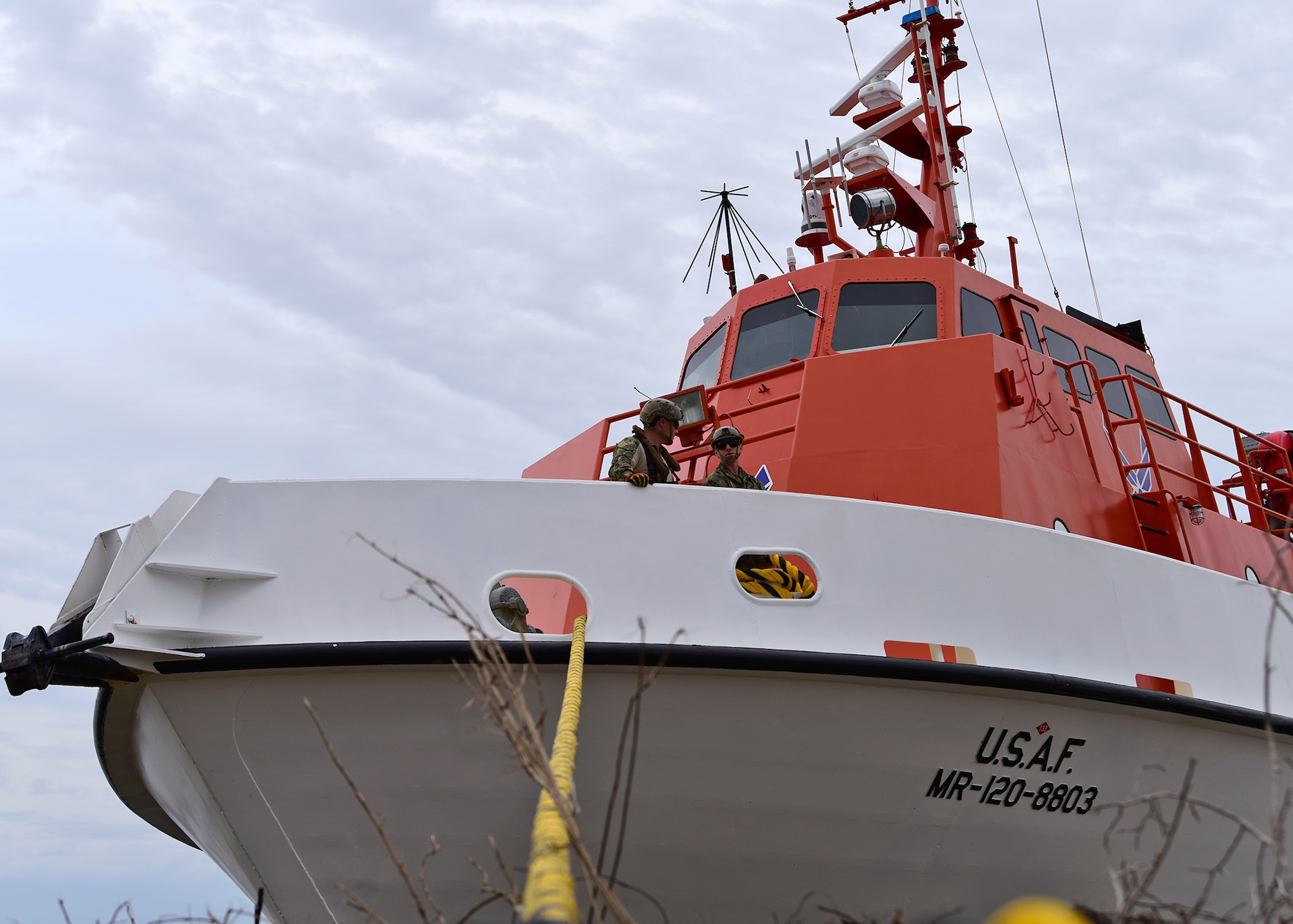 U.S. Navy Sailors stand aboard a beached U.S. Air Force Missile Retriever Ship while at Tyndall Air Force Base, Fla., Dec. 13, 2018. During the onslaught of Hurricane Michael over two months ago, the vessel broke free and was pushed ashore. Sailors from Mobile Diving and Salvage Unit (MDSU) 2, homeported at Joint Expeditionary Base Little Creek-Ft. Story, partnered with Tyndall personnel to return the vessel to the water. The Missile Retriever ship is responsible for the location and recovery of Subscale Aerial Targets in the Gulf of Mexico W151 Live-Fire Range.  MR’s also conduct launch and recovery corridor clearance operations for both SSAT and Fullscale Aerial Target Missions.(U.S. Air Force photo by Senior Airman Isaiah J. Soliz)