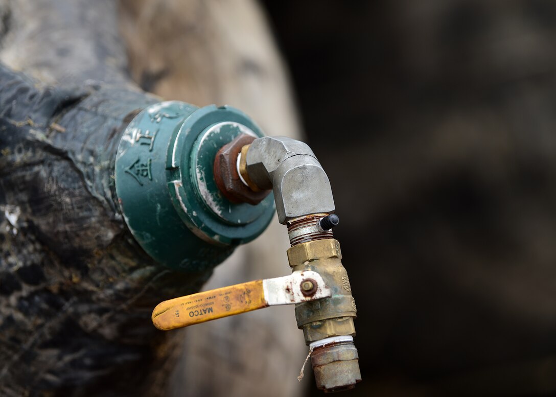 A valve is shown attached to a large inflatable bladder at Tyndall Air Force Base, Fla., Dec. 13, 2018. Sailors and contractors partnered with Tyndall personnel to return the beached U.S. Air Force Missile Retriever Ship to the water more than two months after Hurricane Michael pushed it ashore. (U.S. Air Force photo by Senior Airman Isaiah J. Soliz)