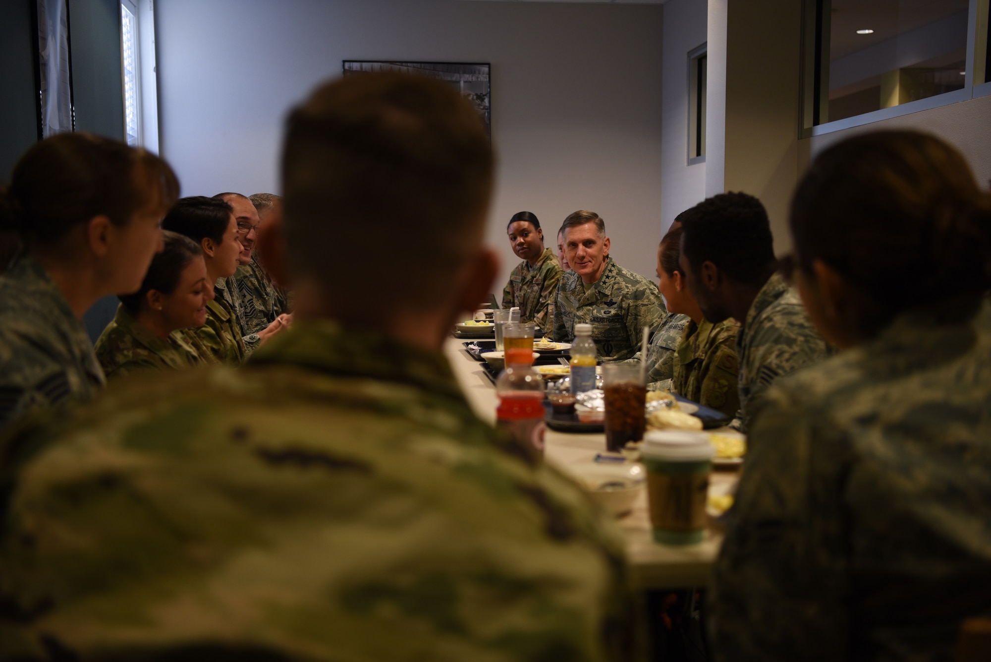 U.S. Air Force Gen. Timothy Ray, Air Force Global Strike Command commander, visits with Airmen during breakfast at F.E. Warren Air Force Base, Wyo., Dec. 11, 2018. During the visit, Ray emphasized the importance of exhibiting excellence as professional warfighters, building integrated teams, and developing people both personally and professionally to produce trained and ready Airmen. (U.S. Air Force photo by Airman 1st Class Abbigayle Wagner)