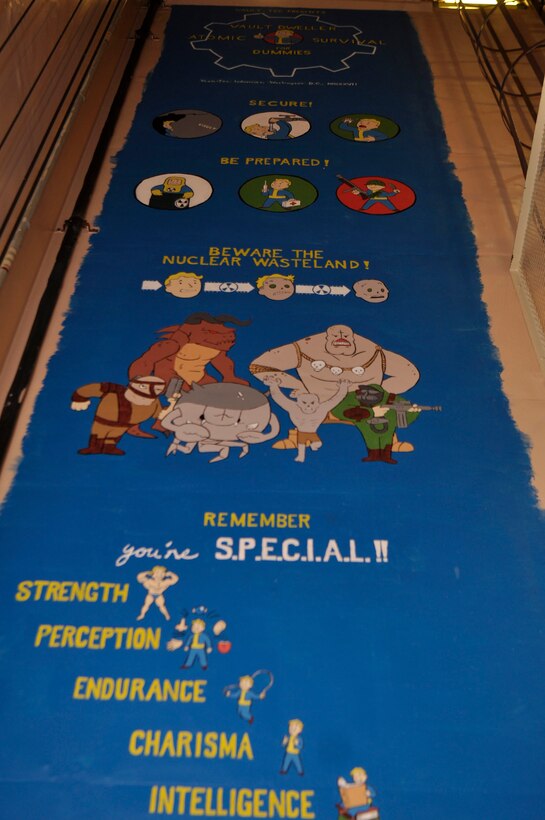 A "Fallout" themed mural painted by Tech. Sgt. Raymond Kiser of the 320th Missile Squadron stretches down a missile alert facility elevator shaft way at F.E. Warren Air Force Base, Wyo., Aug. 21, 2018.