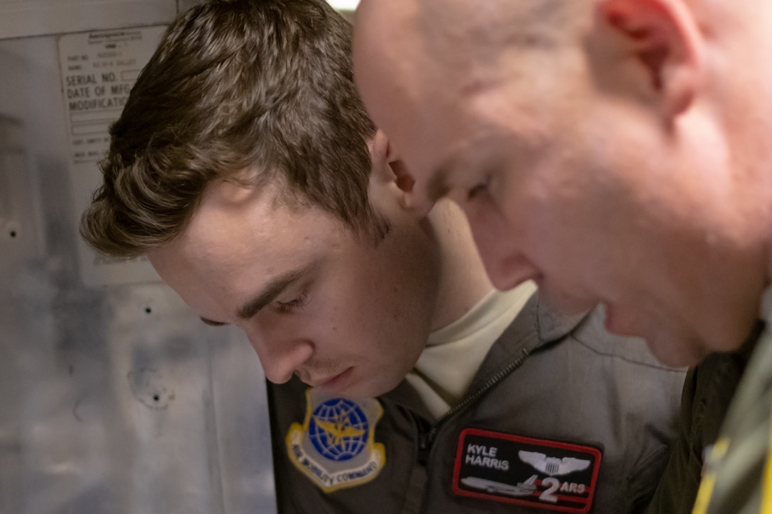 A U.S. Air Force KC-10 Extender pilot Lt. Col. Robert McAllister and 1st Lt. Kyle Harris with the 78th Air Refueling Squadron, 514th Air Mobility Wing and 2d Air Refueling Squadron, 305th Air Mobility wing, respectively, from Joint Base McGuire-Dix-Lakehurst, N.J., go over mission details December 7, 2018. The 514th is an Air Force Reserve Command unit located at Joint Base McGuire-Dix-Lakehurst, N.J. (U.S. Air Force photo by Staff Sgt. Michael Ki Hong)