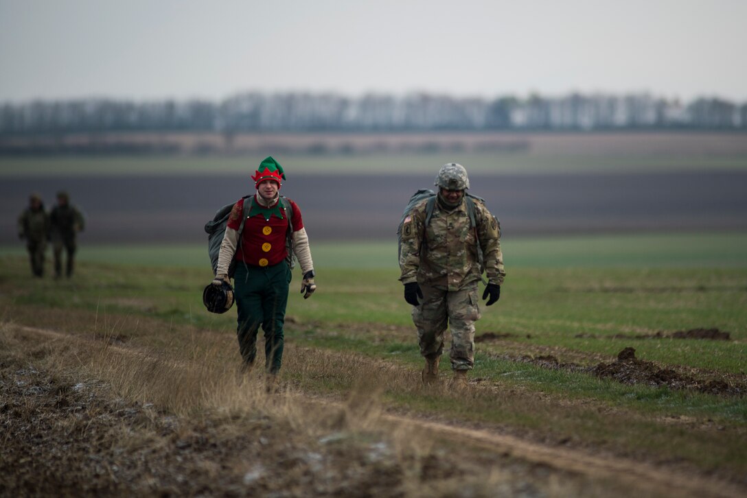 Santa and his helpers, along with members of the U.S. Air Force, U.S. Army, and seven partner nations conducted static-line and military freefall jumps for Operation Toy Drop 2018, over Alzey Drop Zone, Germany Dec. 11-13, 2018.