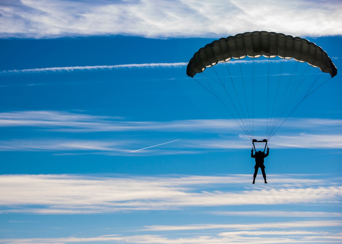 A Spanish soldier performs a military free-fall jump from a U.S. Marine Corps KC-130T during Death From Above in Torrejon, Spain, Nov. 29, 2018. Death From Above is a bilateral exercise that allows U.S. Marines with Special Purpose Marine Air-Ground Task Force-Crisis Response-Africa and Spanish soldiers to practice high-altitude jumps and air-delivery drops. SPMAGTF-CR-AF is a rotational force deployed to conduct crisis-response and theater-security operations in Europe and Africa. (U.S. Marine Corps photo by Sgt. Katelyn Hunter)